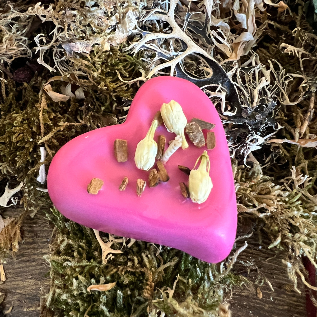Hearts shaped floating love spell candle