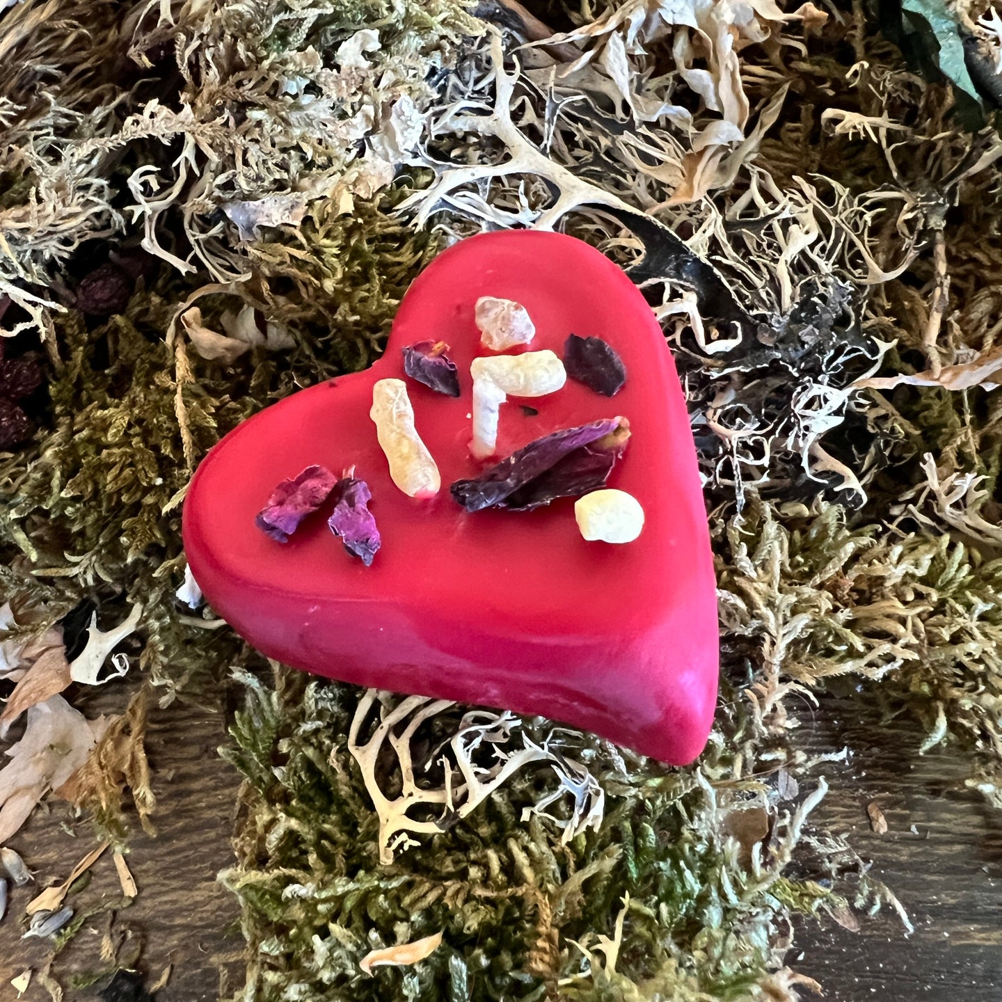 Hearts shaped floating love spell candle