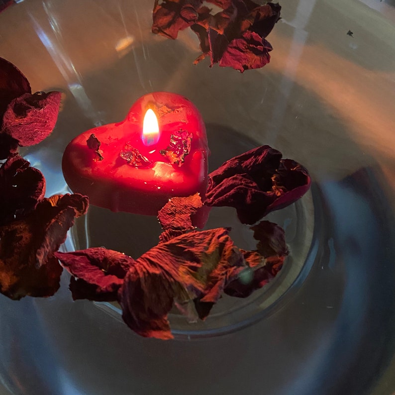 Hearts shaped floating love spell candle